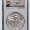 A silver eagle is in an air-tite holder.