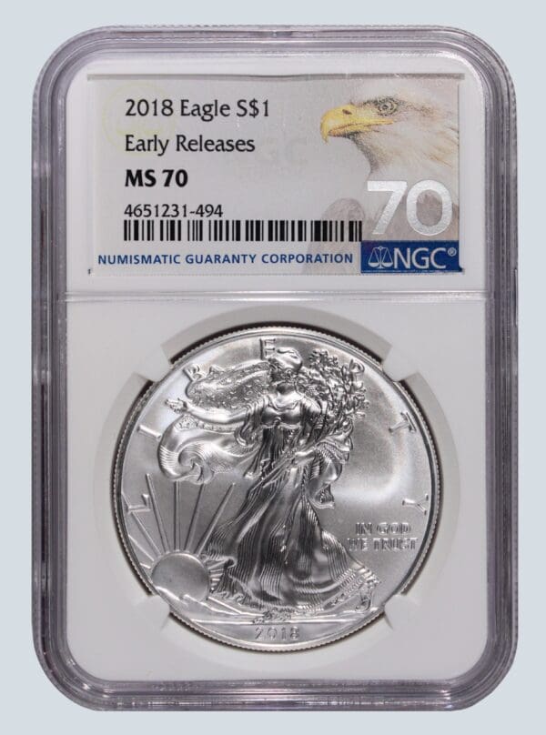 A silver eagle coin is on display.